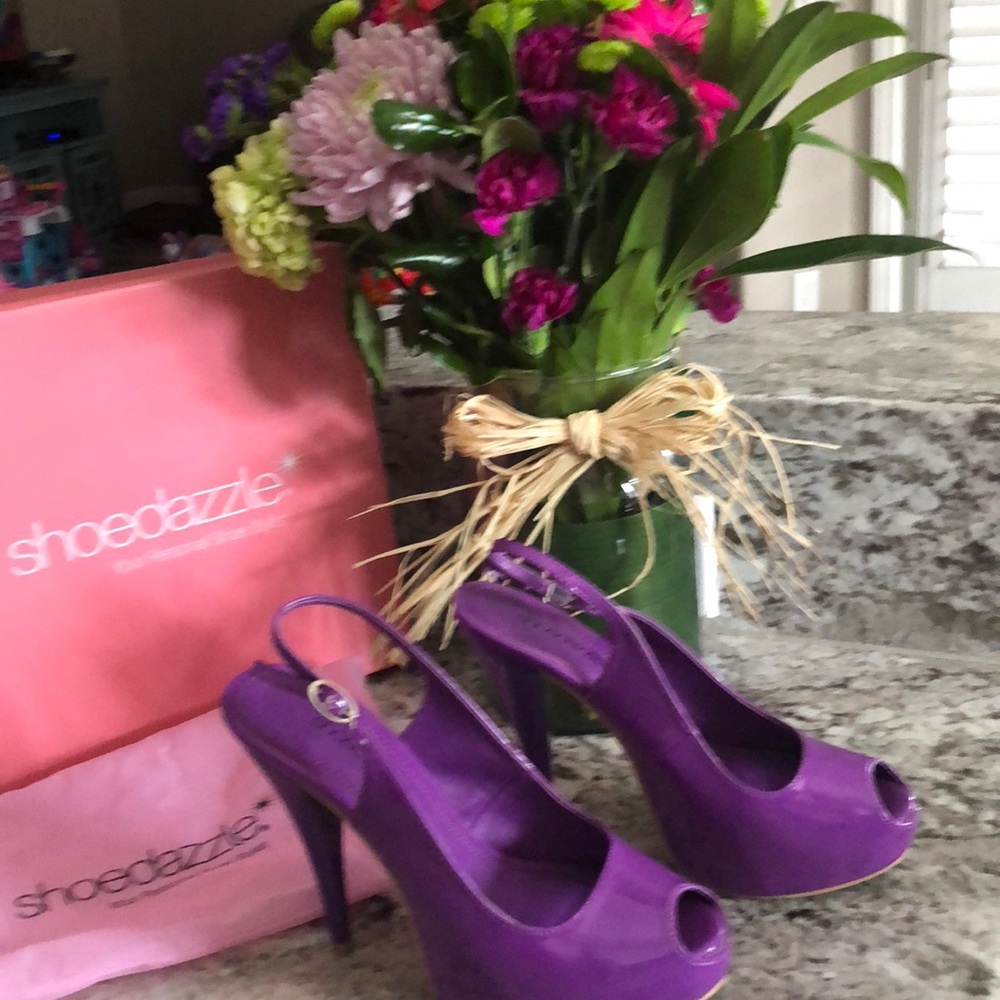 Purple sling back peep toe platforms